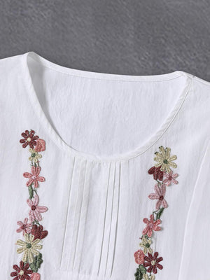 Elegant Long-Sleeve Floral-Trimmed Patchwork Top